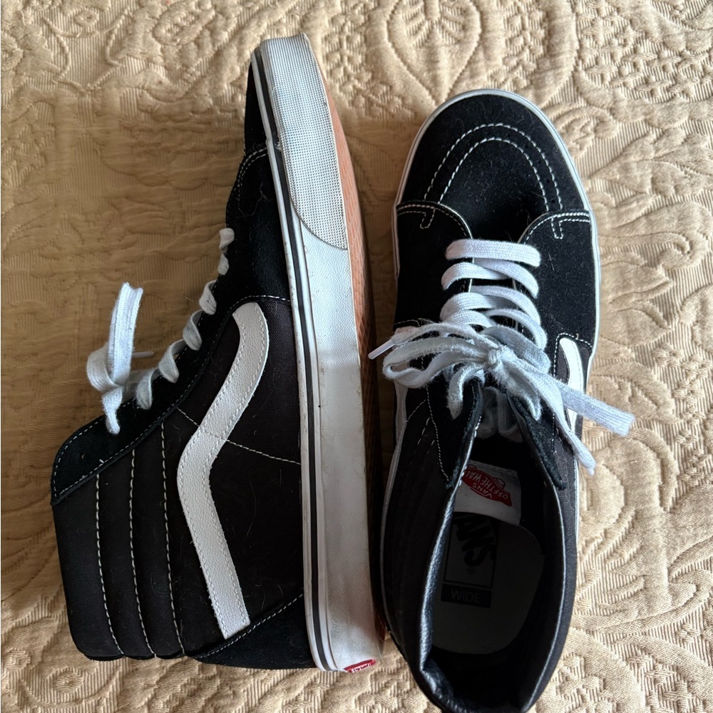 Vans black high top sneakers